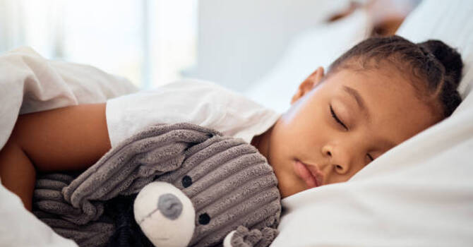 How Much Sleep Does a Growing Child Need? image